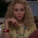 Carrie’s yellow pearl flower embellished top on The Carrie Diaries