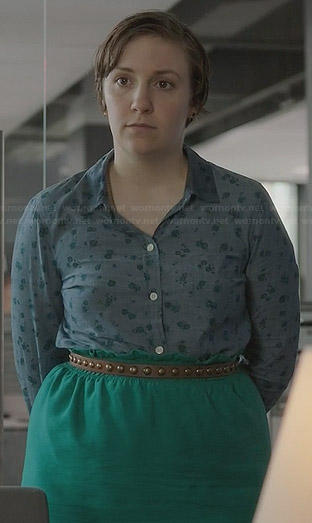 Hannah’s floral chambray shirt, green skirt and studded belt on Girls