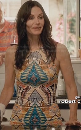 Jules's yellow printed dress and gold cork wedges on Cougar Town