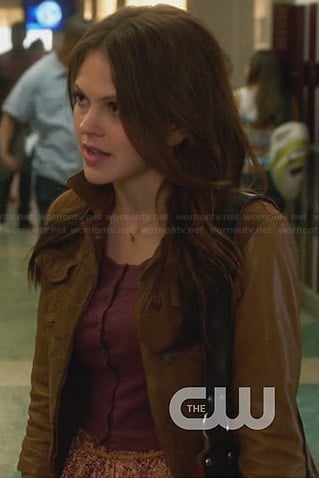 Emery’s tan jacket with leather sleeves on Star-Crossed