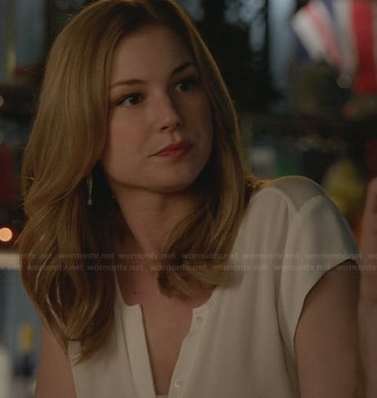 Emily’s white cap sleeve button front top on Revenge