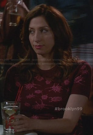 Gina’s red dress with pink bug print on Brooklyn Nine-Nine