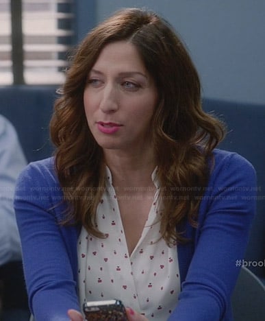 Gina's white printed v-neck blouse on Brooklyn Nine-Nine