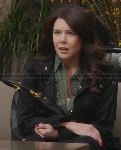 Sarah’s black jacket and gold-detail handbag on Parenthood