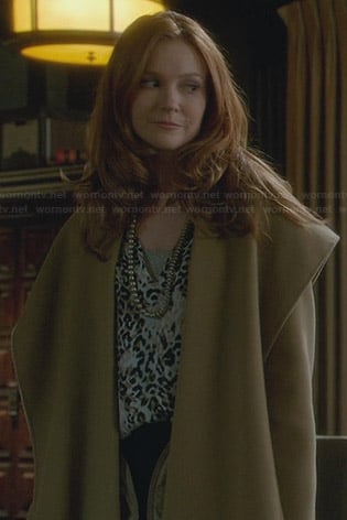 Abby's leopard print blouse and draped coat on Scandal