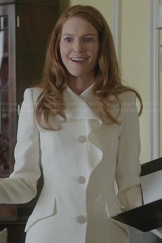 Abby's white ruffle coat on Scandal