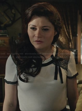Belle’s white top with black lace shoulders on Once Upon a Time