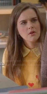 Betsey’s yellow heart sweater on The Mindy Project