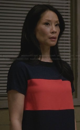 Joan's navy blue and orange colorblock dress on Elementary