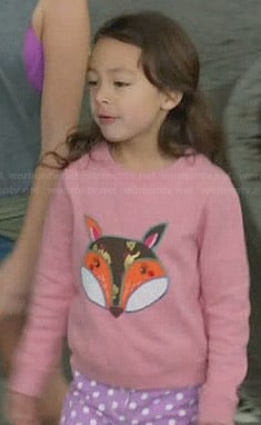 Lily's pink fox sweater and purple polka dot shorts on Modern Family