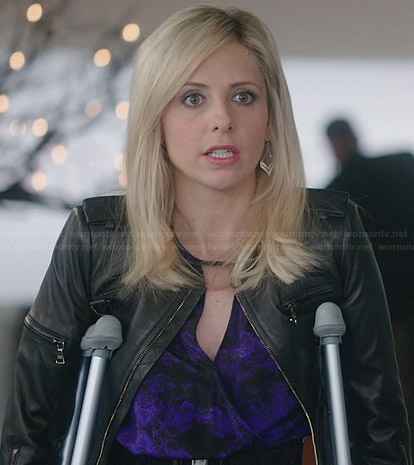 Sydney's purple printed cross front dress and cropped leather jacket on The Crazy Ones