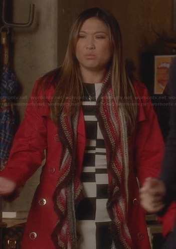 Tina’s black and white colorblock dress and red trench coat on Glee