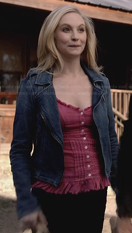 Caroline’s pink button front top with ruffles and denim moto jacket on The Vampire Diaries