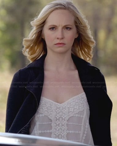 Caroline’s white embroidered top and black moto jacket on The Vampire Diaries