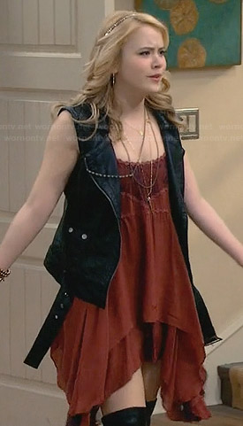 Lennox's orange asymmetric dress and leather vest on Melissa and Joey