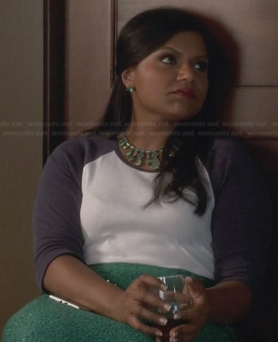 Mindy's white and navy baseball tee, green sequin skirt and green necklace on The Mindy Project