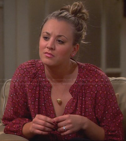 Penny's burgundy printed split-neck blouse on The Big Bang Theory