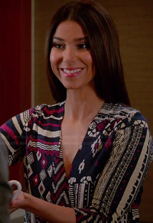 Carmen’s navy and pink geometric patterned wrap top on Devious Maids