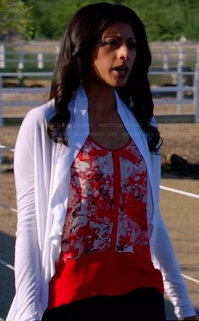Divya's red floral top on Royal Pains