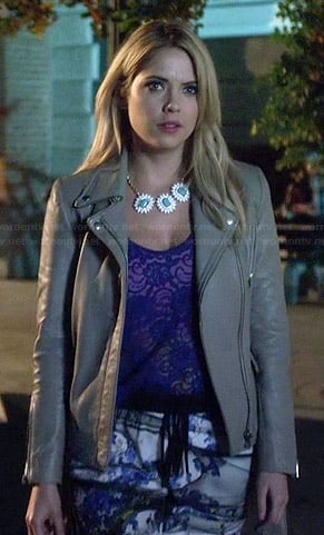 Hanna's blue and yellow printed pants, grey leather jacket and flower necklace on Pretty Little Liars