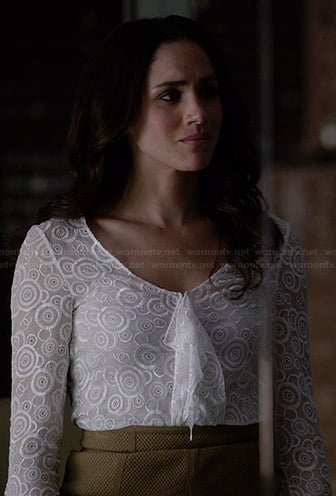 Rachel's white circle embroidered ruffle front top on Suits