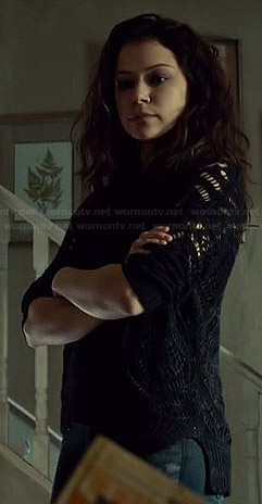 Sarah's black sweater with open stitch sleeves on Orphan Black