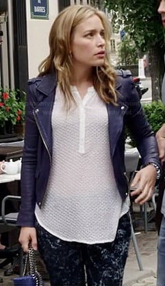 Annie's white eyelet top, blue leather jacket and blue chain trim bag on Covert Affairs