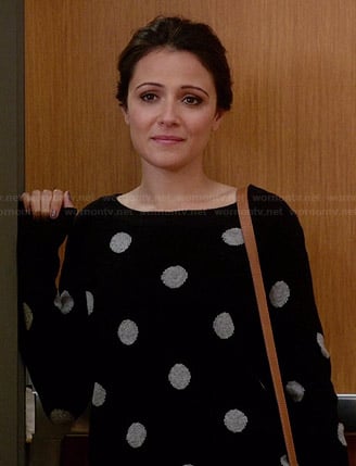 April’s black and white polka dot sweater on Chasing Life