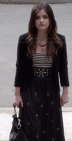 Aria’s black fringed cardigan, grommett detailed maxi skirt and ripped handbag on Pretty Little Liars