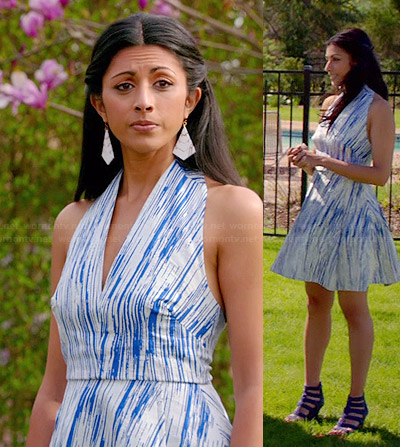 Divya’s blue and white printed halter dress and blue wedges on Royal Pains