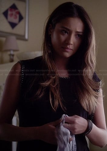 Emily's black chain trimmed top on Pretty Little Liars