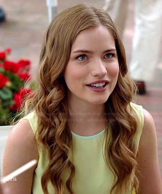 Emma’s yellow top with mint green trim and open back on Royal Pains