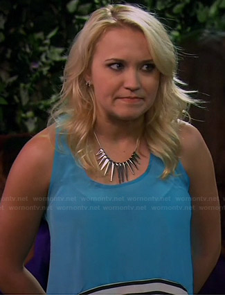 Gabi's blue tank top with striped hem and silver spiked necklace on Young and Hungry