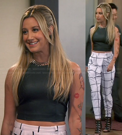 Logan's (Ashley Tisdale) white checked trousers and leather crop top on Young and Hungry