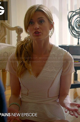 Paige's white textured peplum top with mesh sleeves on Royal Pains