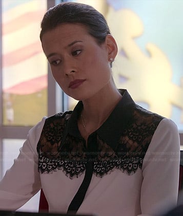 Raquel’s white blouse with black lace panel on Chasing Life