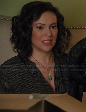 Savi's black printed split neck blouse on Mistresses