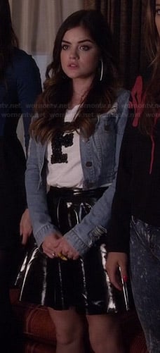 Aria’s embellished “F” tee, patent leather skirt and denim jacket on Pretty Little Liars