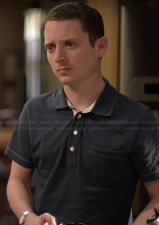 Ryan's navy blue polo shirt on Wilfred