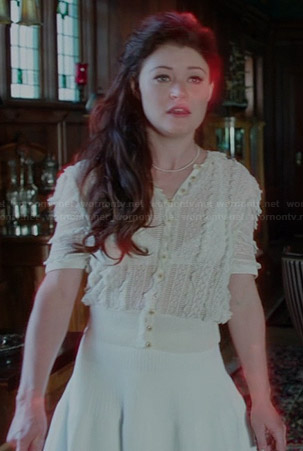 Belle’s cream ruffled cardigan and white ribbed skirt on Once Upon a Time