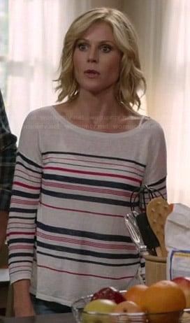 Claire's pink and navy striped sweater on Modern Family