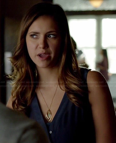 Elena's navy blue v-neck button front top on The Vampire Diaries