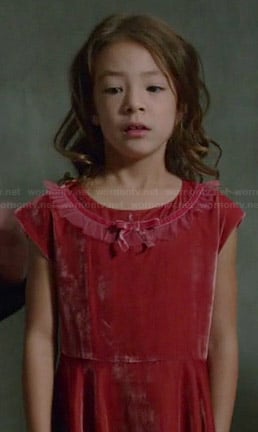 Lily’s red velvet bow dress on Modern Family