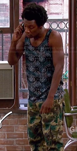 Motif's printed tank top and palm and polka dot printed cargo pants on Mulaney