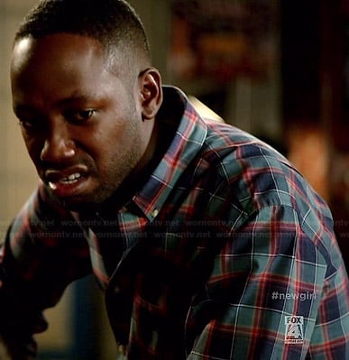 Winston's blue and red plaid shirt on New Girl