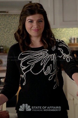 Annie's black and white flower sweater on Marry Me
