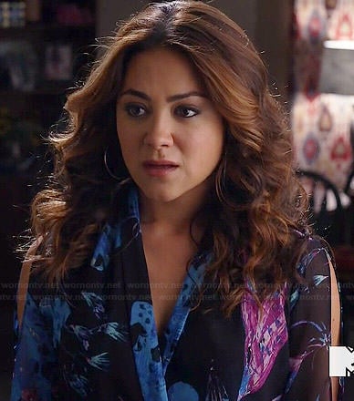 Elena's black, pink and blue floral wrap blouse on Happyland