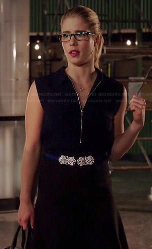 Felicity’s navy zip neck dress and blue flower belt on Arrow