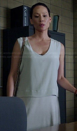 Joan's grey v-neck layered dress on Elementary