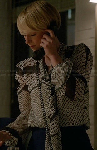 Margaux’s black and white printed blouse with neck tie on Revenge